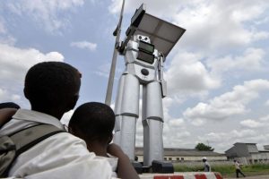giant robot traffic cop in Congo