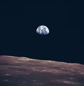 This incredible image of the Earth rise was taken during lunar orbit by the Apollo 11 mission crew in July of 1969.