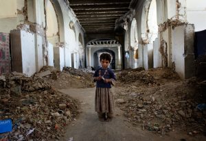An Afghan girl stands in the ruins of Darul Aman Palace on the outskirts of Kabul, Afghanistan, on Oct. 21, 2010. By Chris Hondros/Getty Images