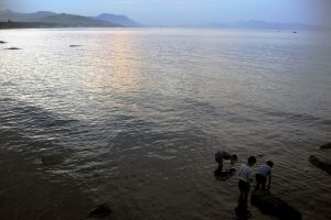 North Korean kids looking for clams Wonsan North Korea